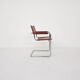 Tubular dining chair with arm rests, 1970's