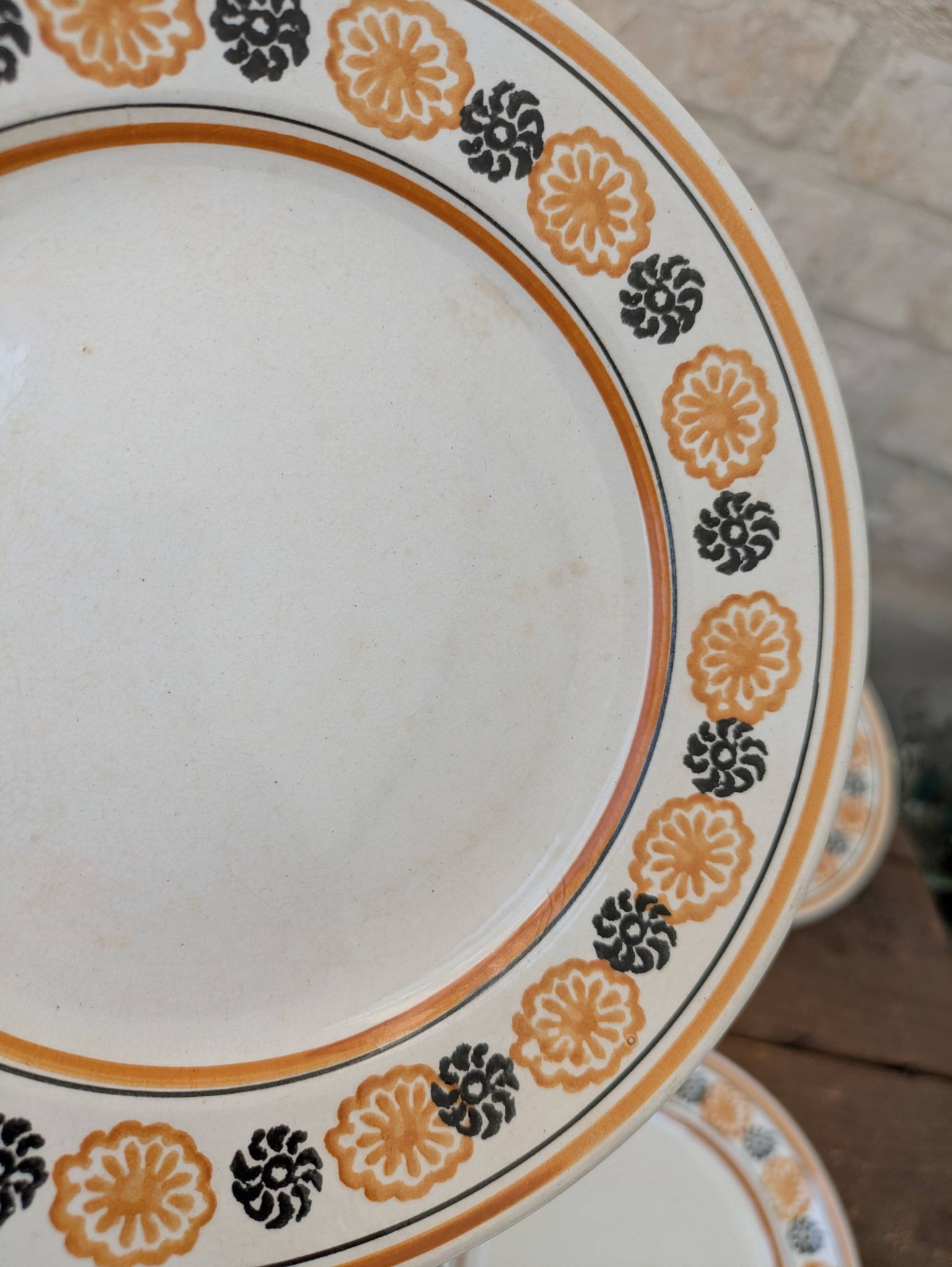 10 dessert plates Saint Amand Amandinoise frilled with orange and black flowers.