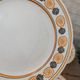 10 dessert plates Saint Amand Amandinoise frilled with orange and black flowers.