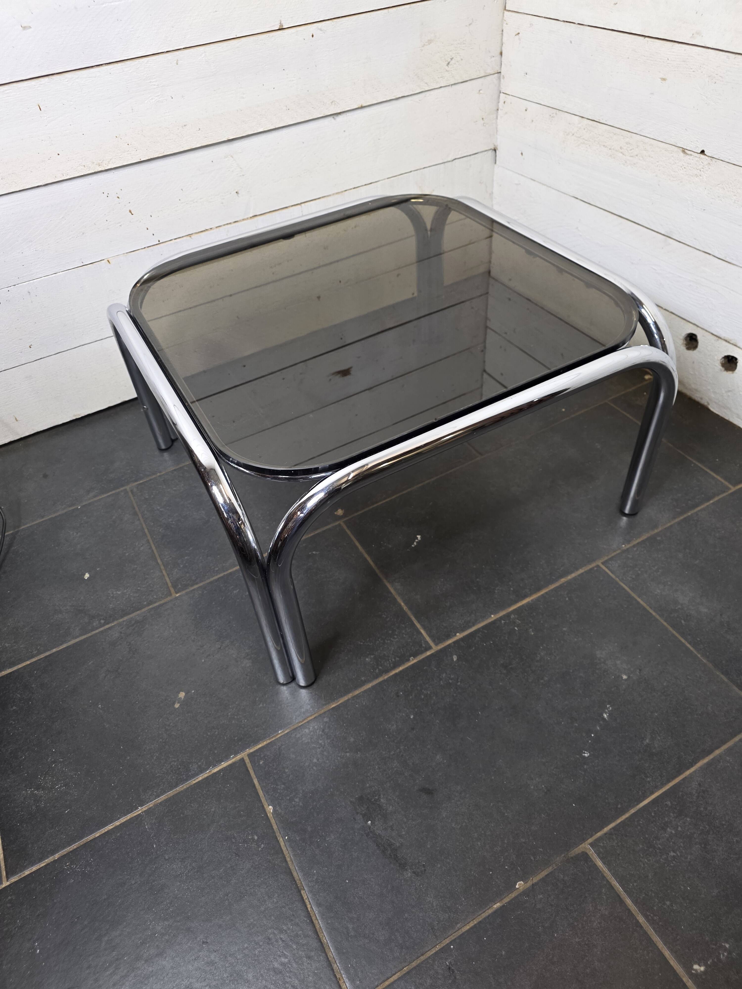Chrome metal coffee table with smoked glass top from the 70s