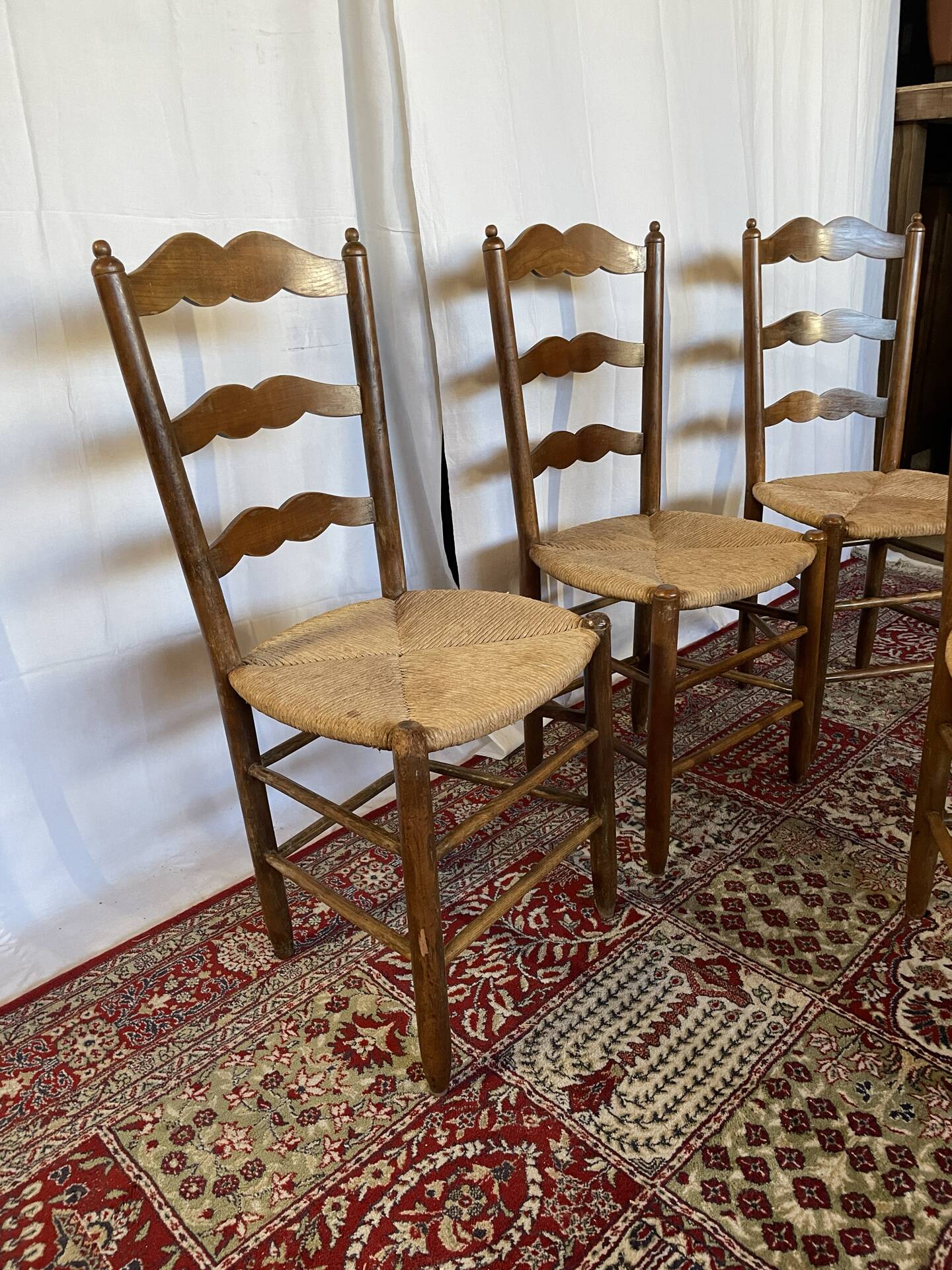 Set of 4 vintage wooden and straw chairs