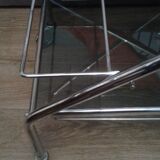 Chrome and smoked glass serving in the year 70
