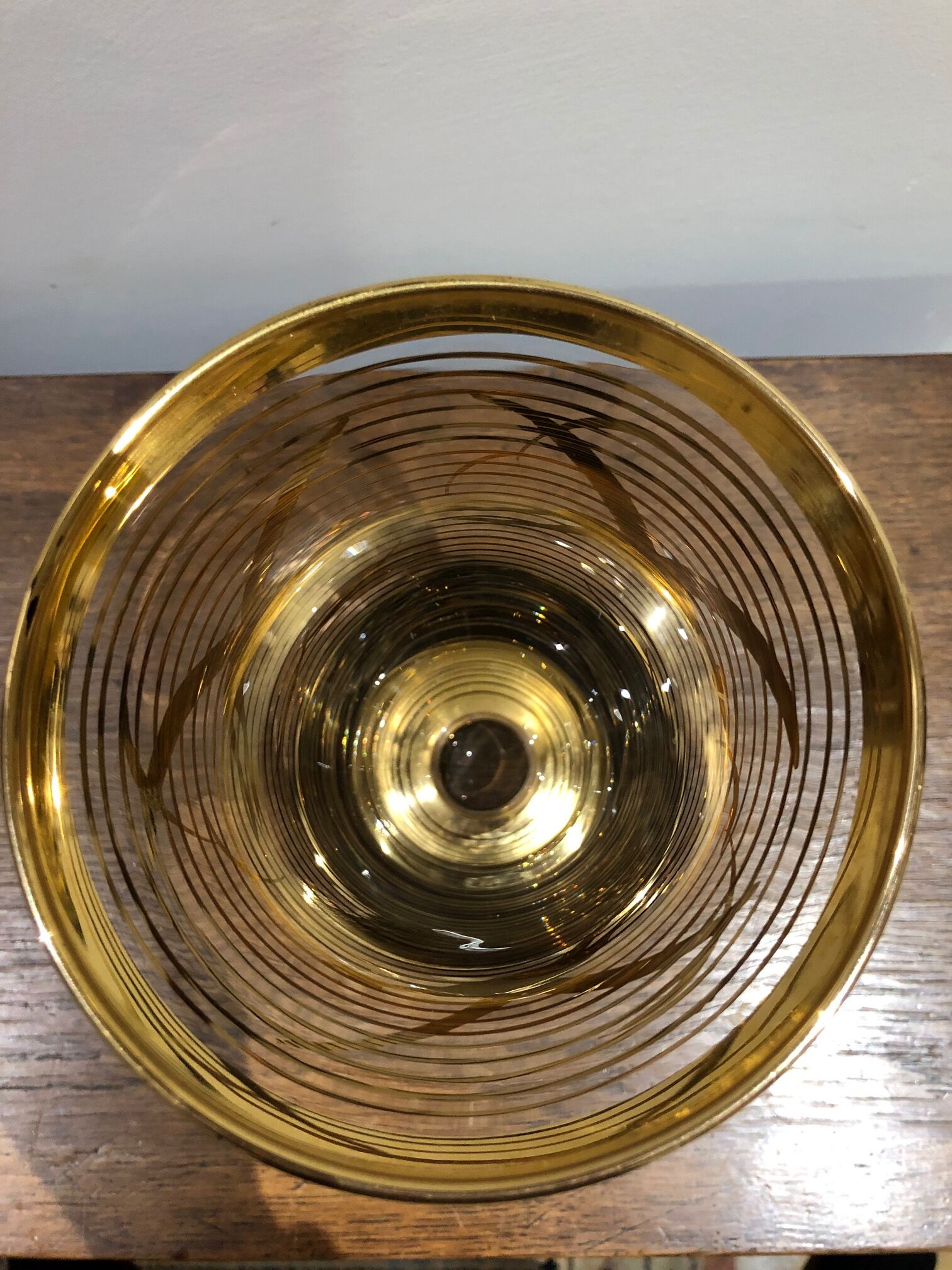 Glass vase with gold bird decoration