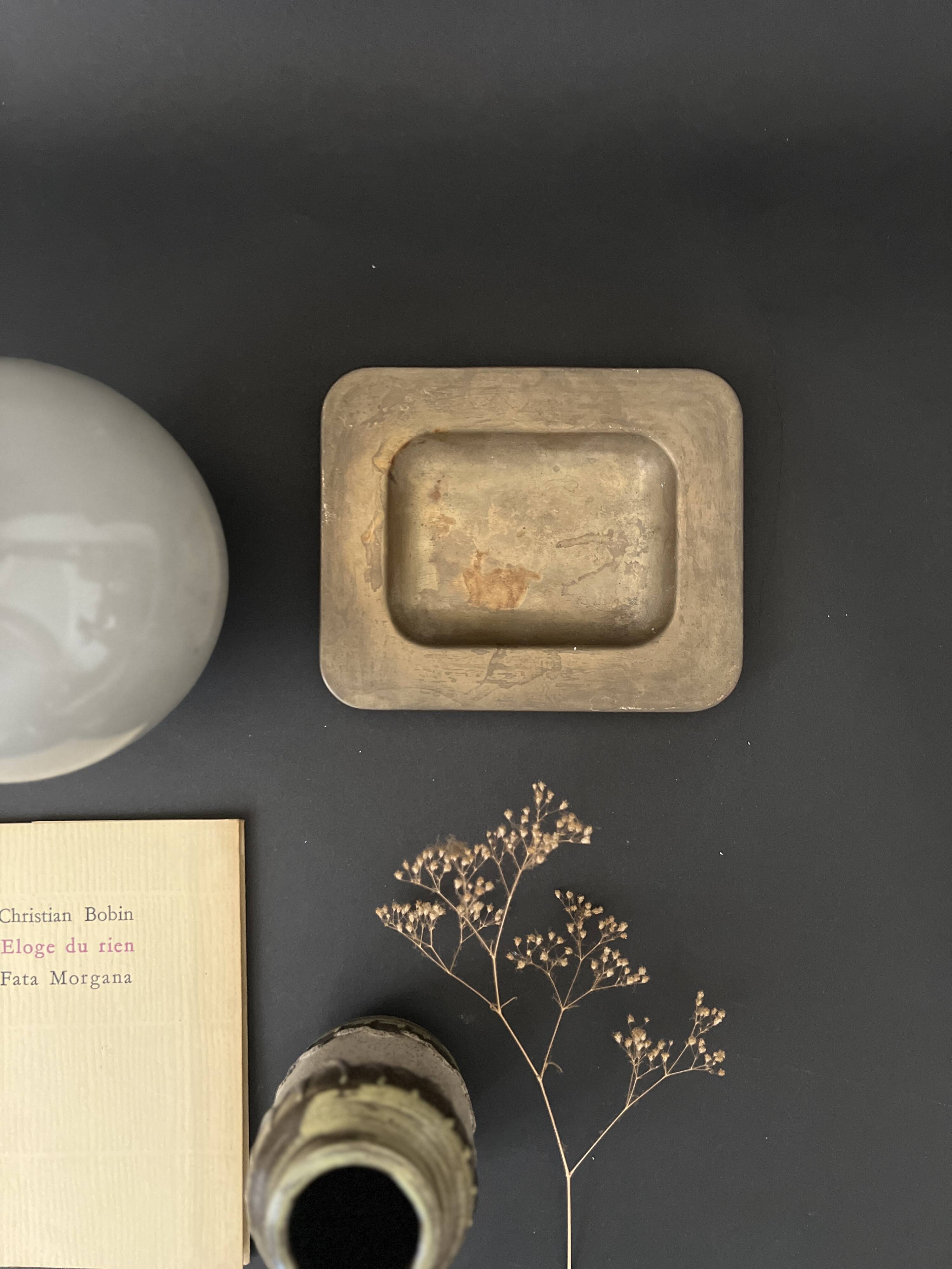 genuine brass pocket emptier, circa 1960