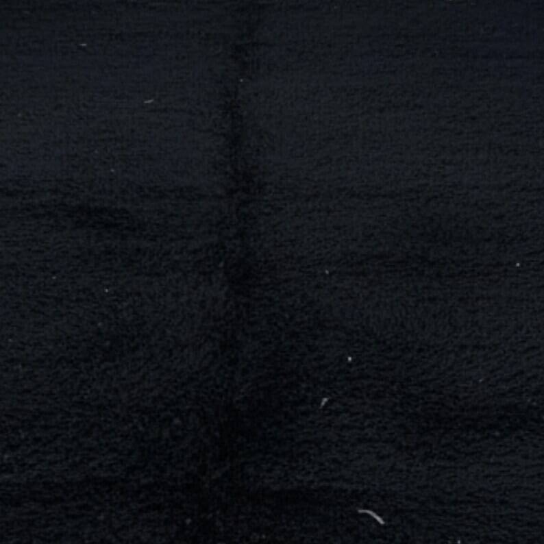 Simple black handmade wool rug 250cm x 150cm