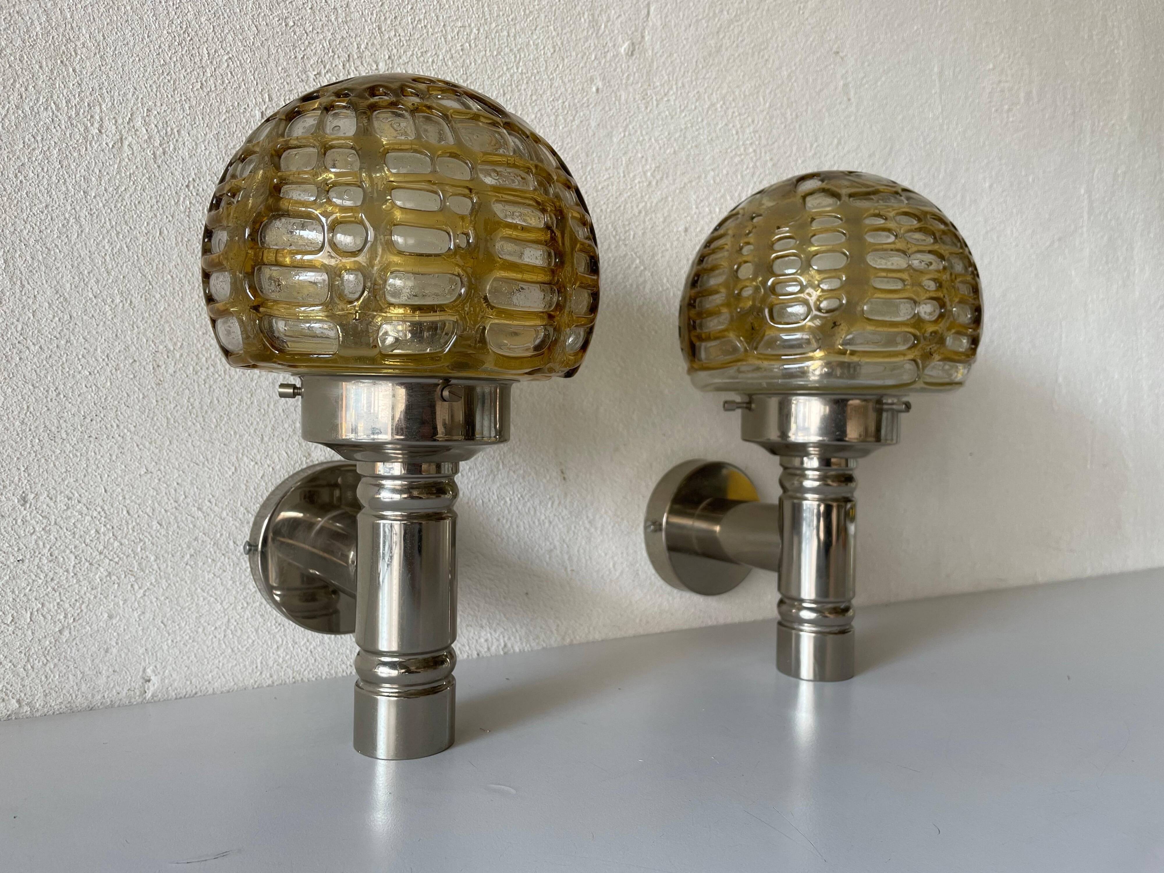 Rare pair of blown glass and chrome wall lights by Doria, 1960s, Germany.