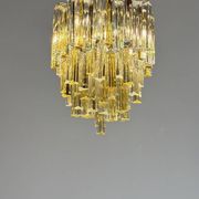 Venetian chandelier in colourless and gold Murano glass, Venini Triedi model, circa 1960.