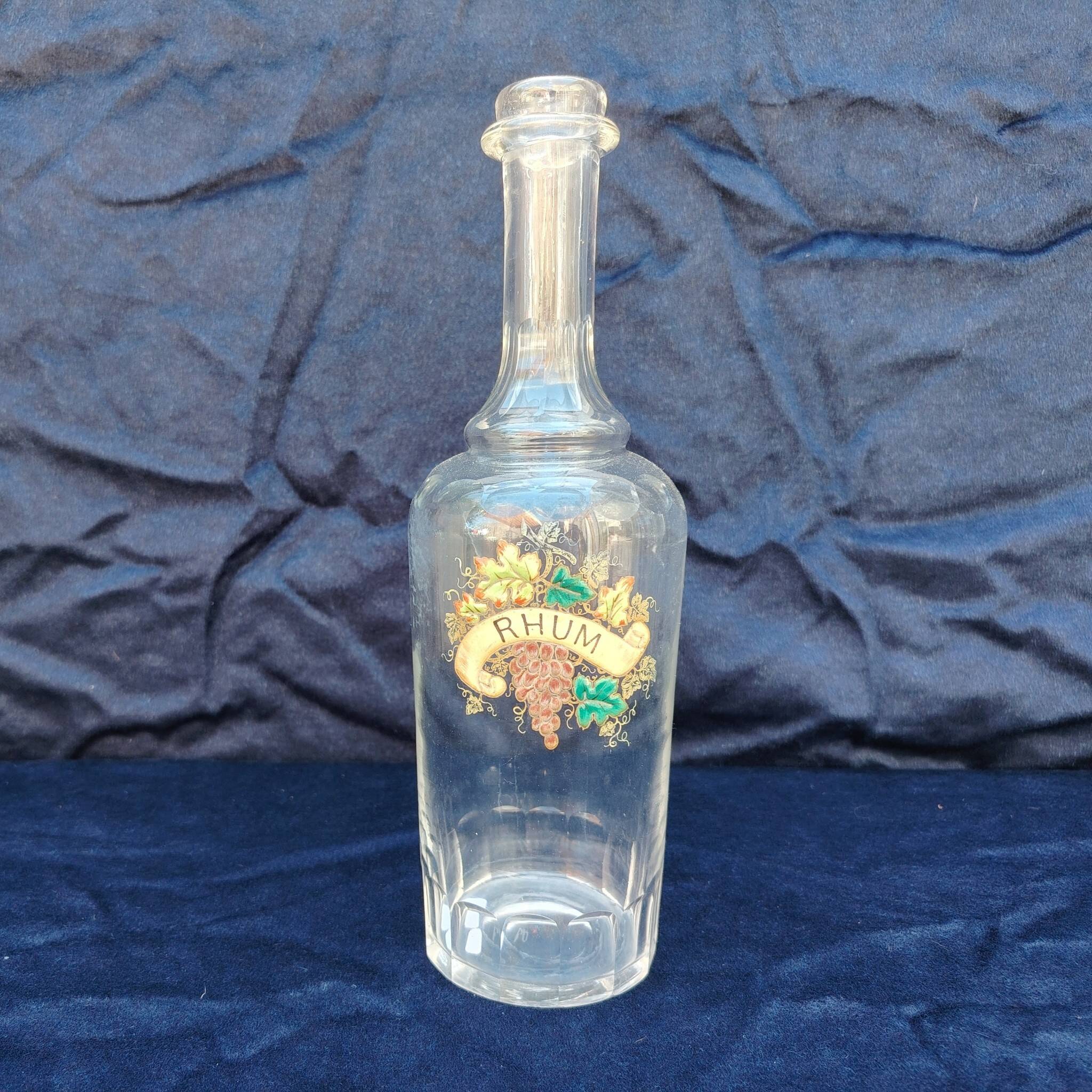 Old rum bottle, enamelled glass, vintage