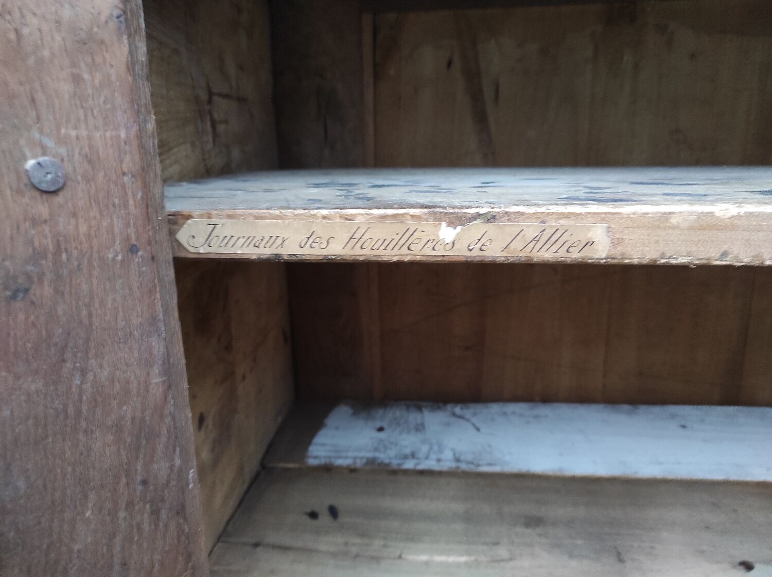 Old rustic Parisian wardrobe patinated white in oak and fir