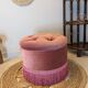 Pouf or footrest in pink velvet with fringes