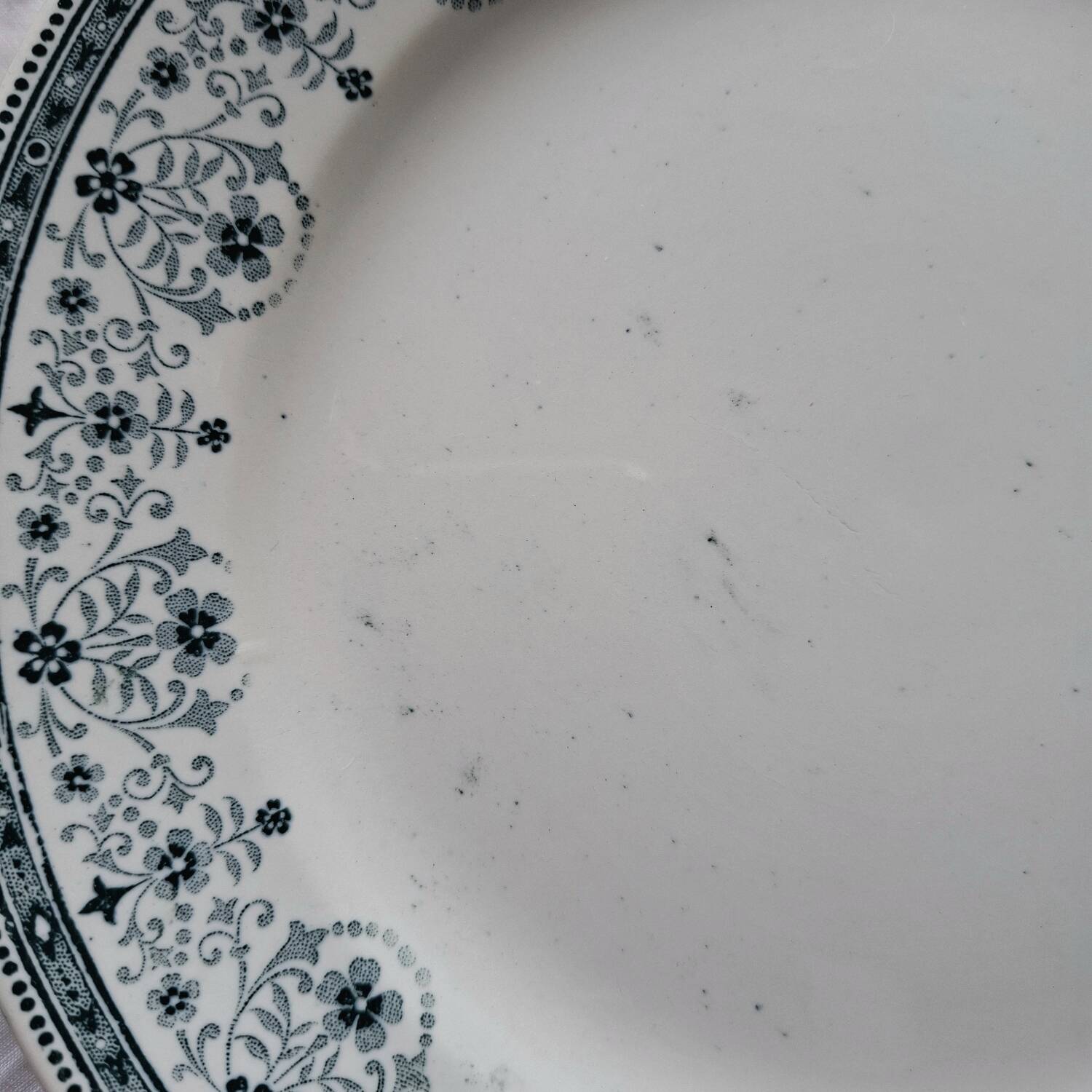 Mismatched old flat plates in iron earthenware