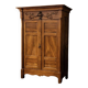 Empire wardrobe in solid walnut, France, mid-19th century.