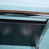 Minimalist coat rack, tubular chrome frame, 1980s Memphis style.