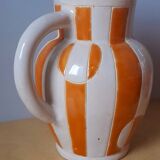 Old enamelled ceramic jug