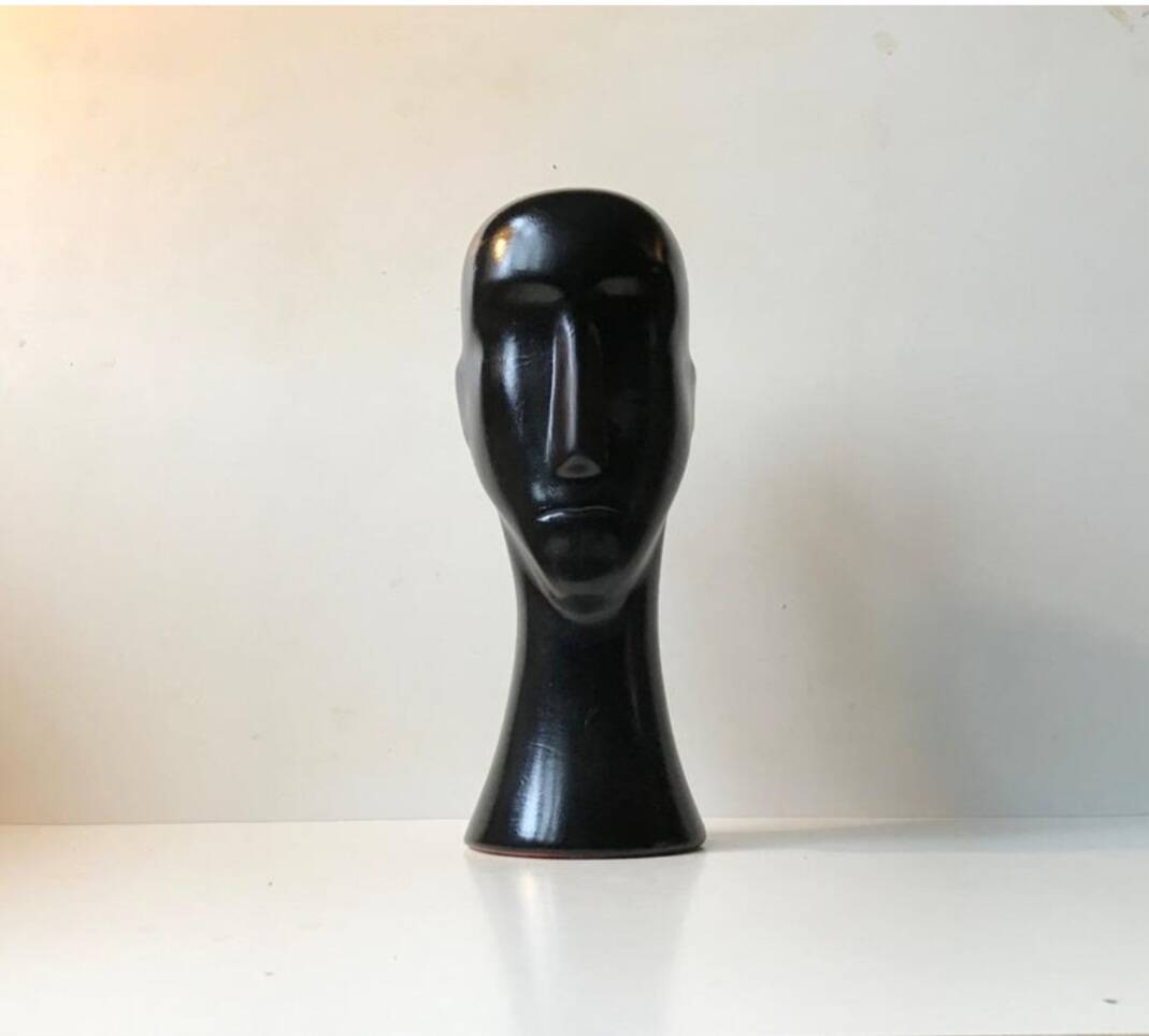 Modernist black ceramic sculpture – stylised head – 1960s