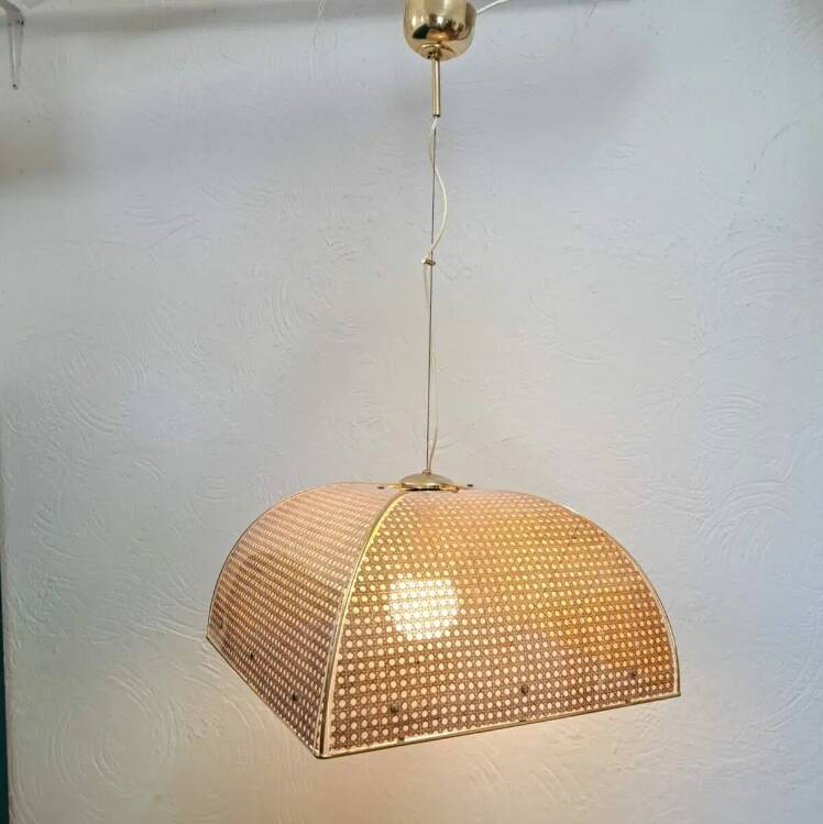 Plexiglass and Vienna straw chandelier.
