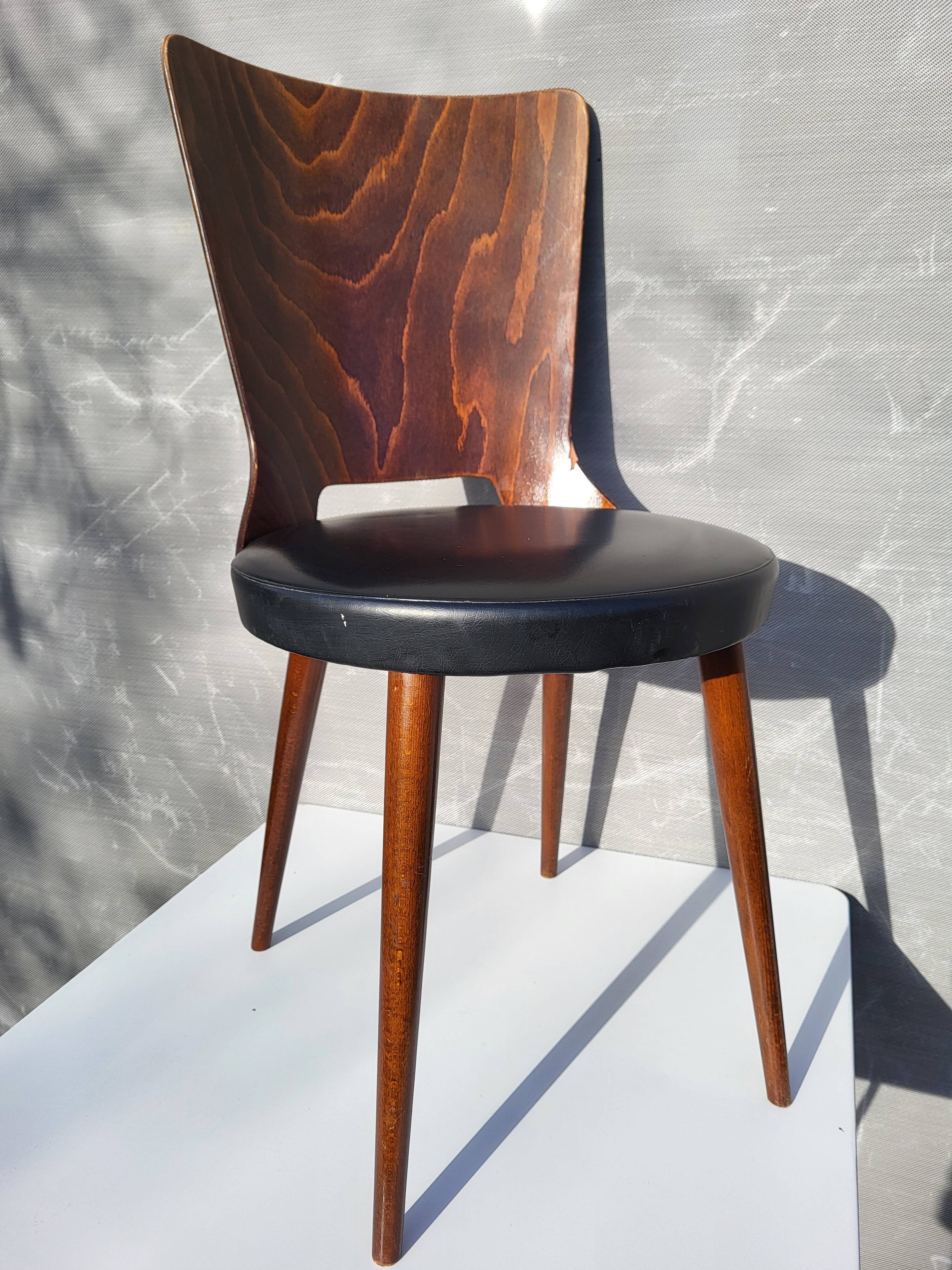 Pair of Dove chairs • Baumann • Black faux leather