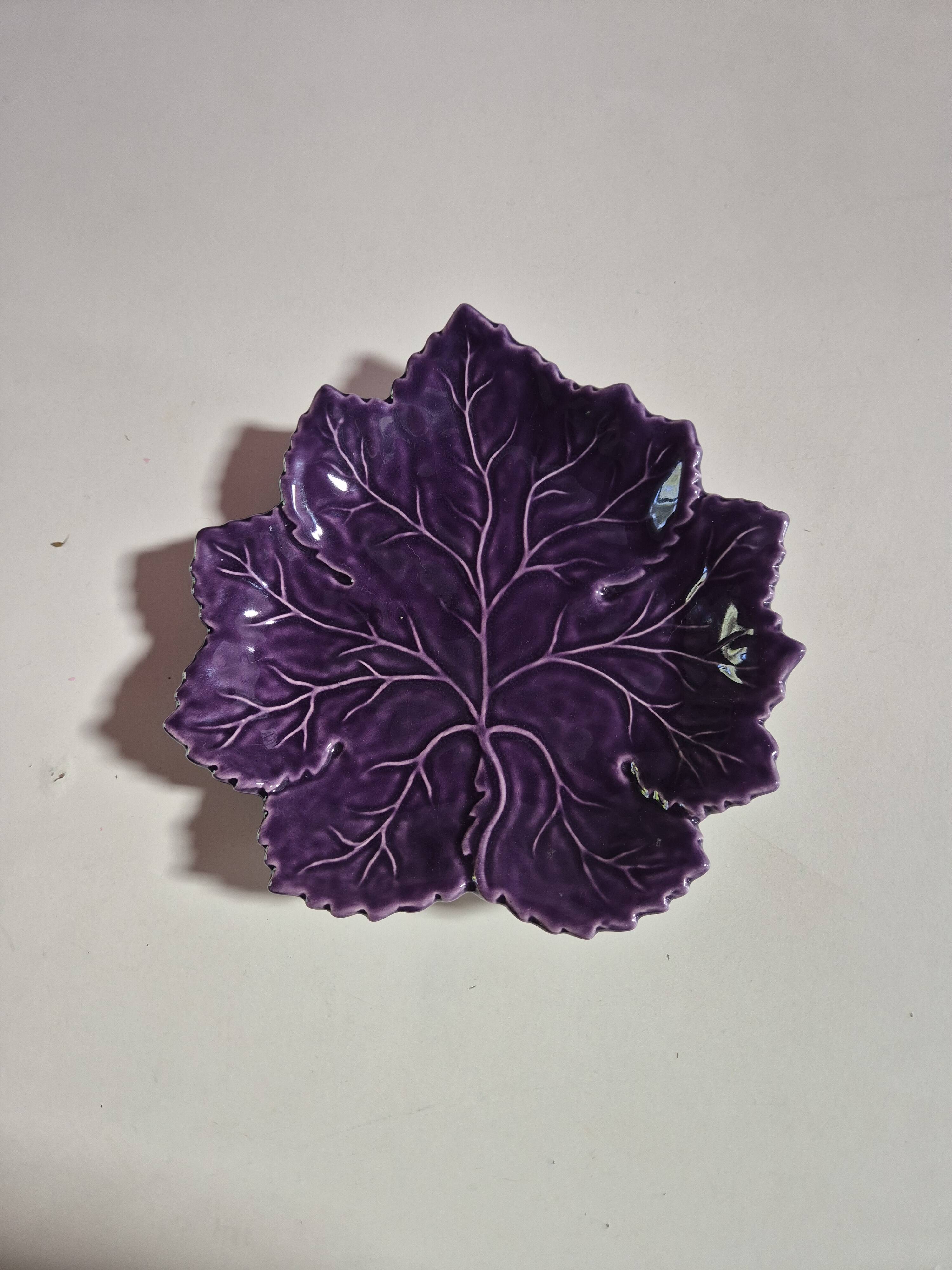 purple ceramic bowl in the shape of a tree leaf