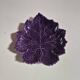 purple ceramic bowl in the shape of a tree leaf