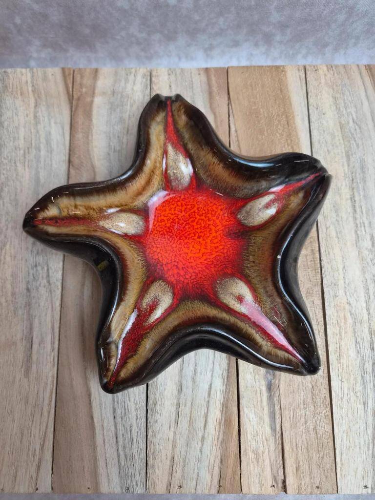 Vintage starfish bowl in ceramic Vallauris red and black lava style.