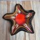 Vintage starfish bowl in ceramic Vallauris red and black lava style.