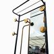 1960s modernist wardrobe. Gold lacquered metal.