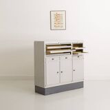 Industrial metal trade furniture equipped with display cases