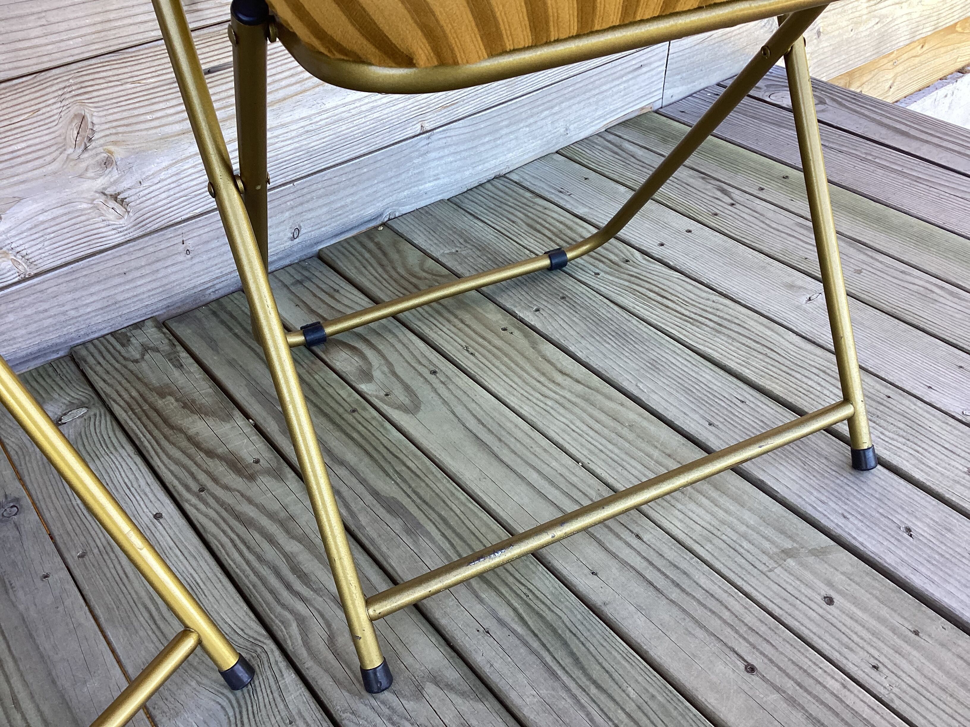 Vintage lafuma folding chair with striped gold fabric