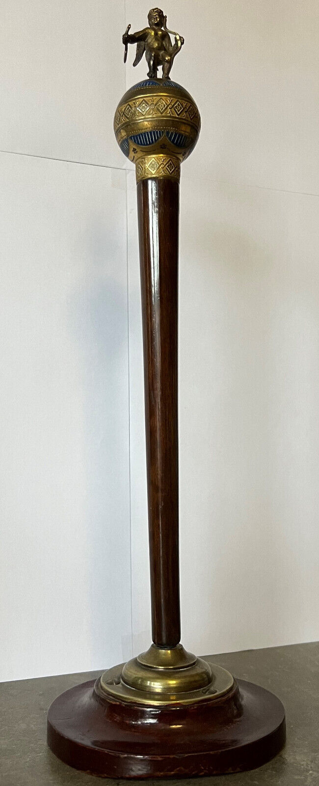 Precious cane tip in mahogany and gilded bronze with polychromy