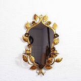 Old candlestick mirror gilded with leaf