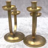 A beautiful pair of antique French Art Deco brass candlesticks