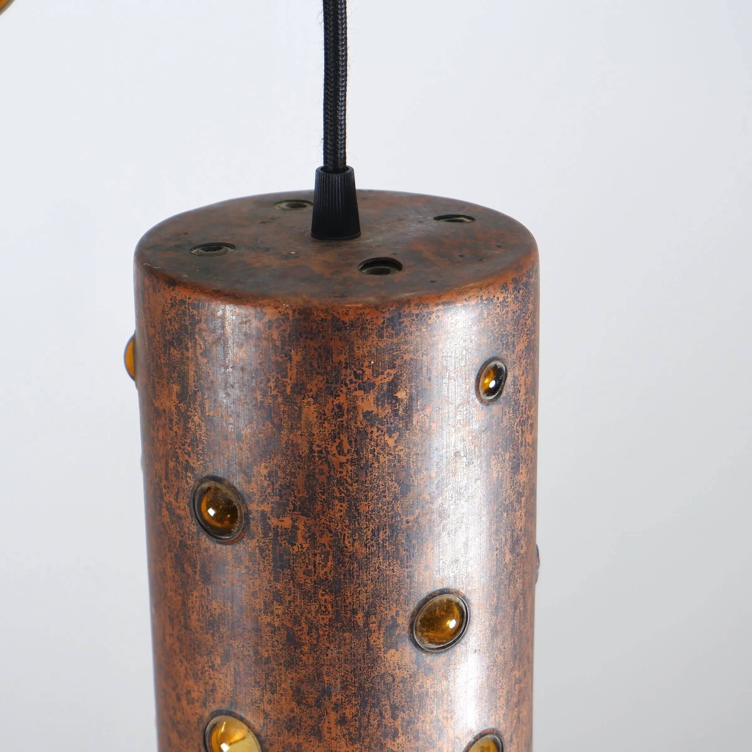 Cylindrical brutalist hanging lamp in copper / glass by Peill & Putzler