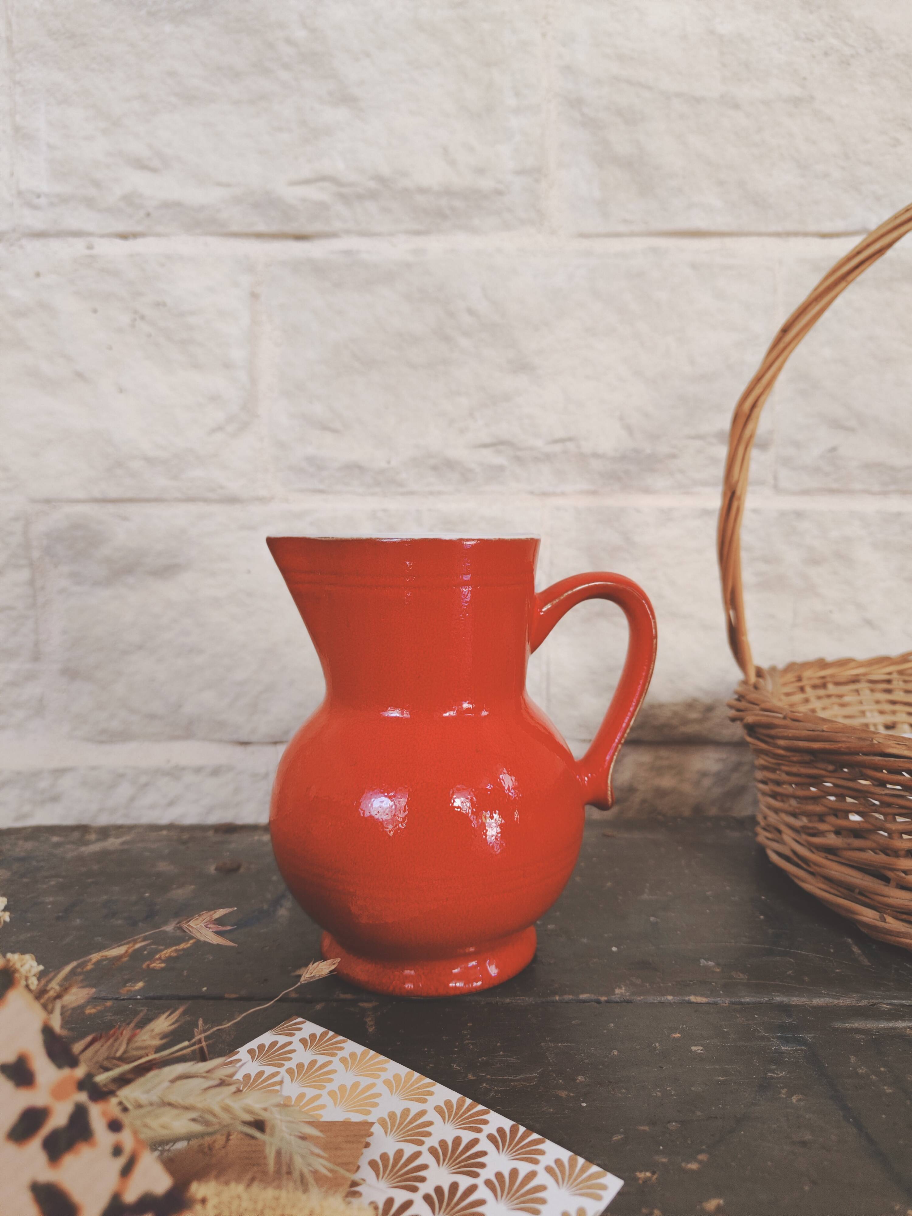 Small red enameled ceramic pitcher Emile Henry