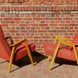 Pair of red armchairs Interier Praha