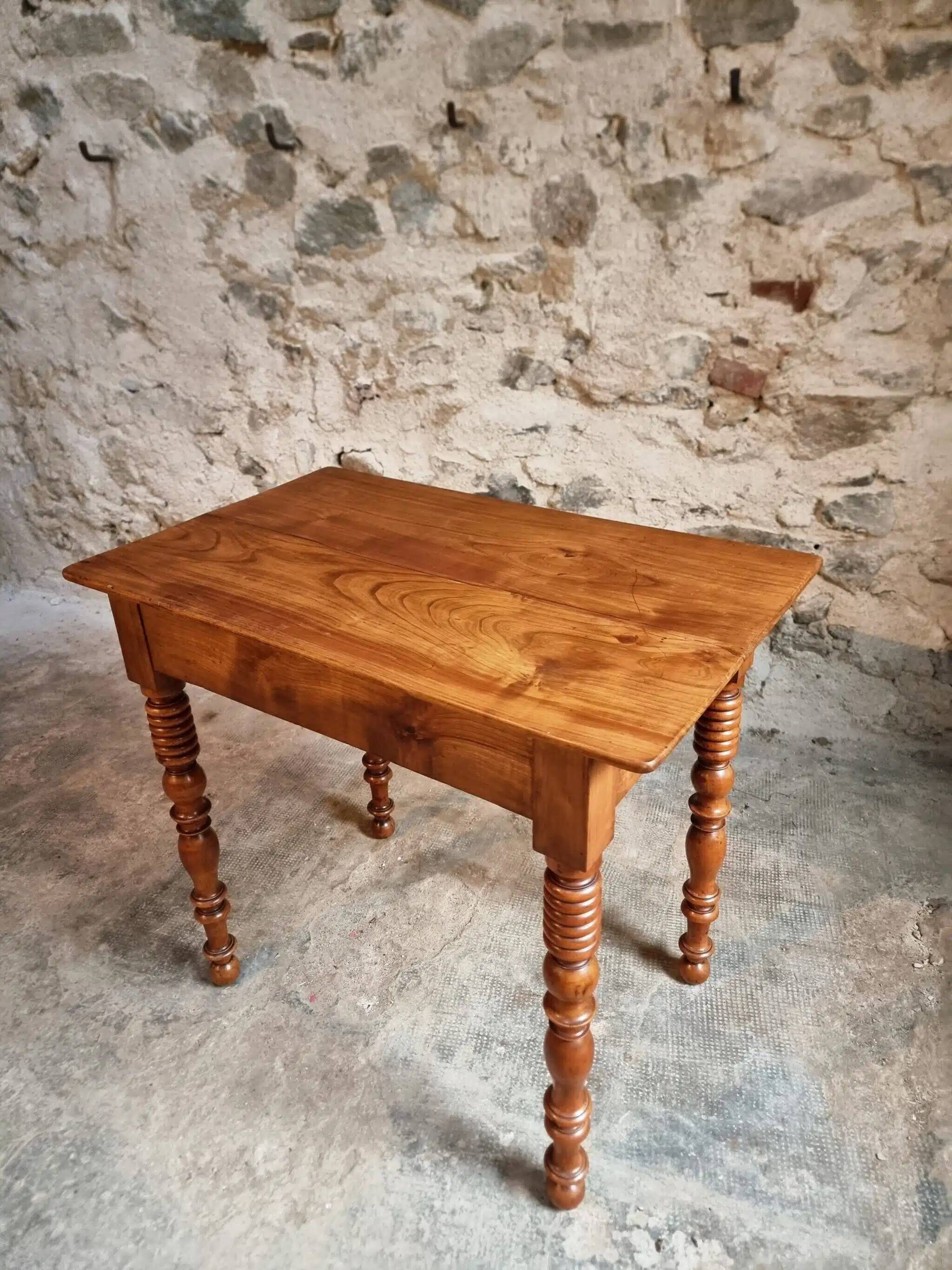 Small antique French writing table in walnut with a drawer, around 1900.