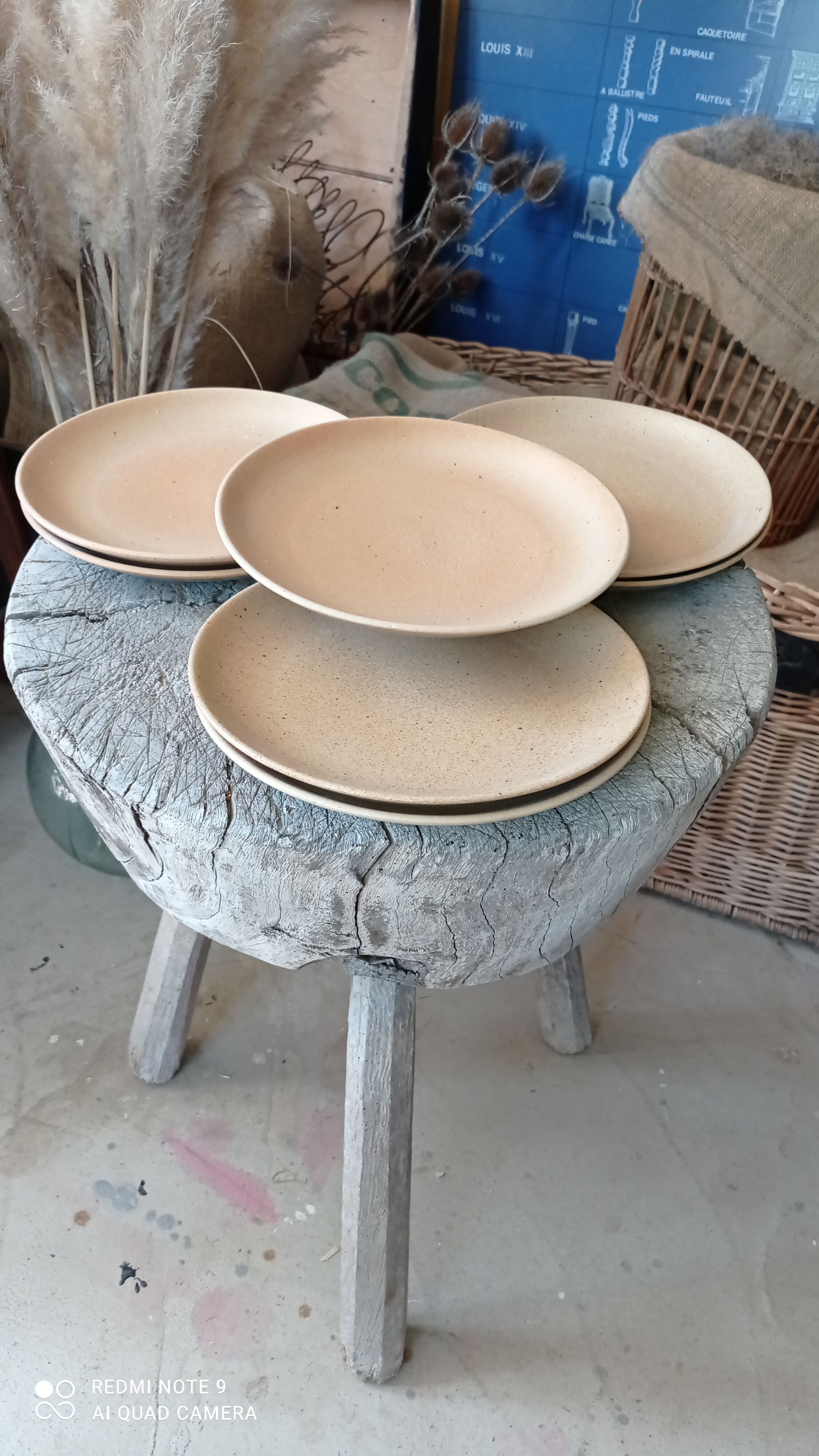 Set of seven plates in sandstone
