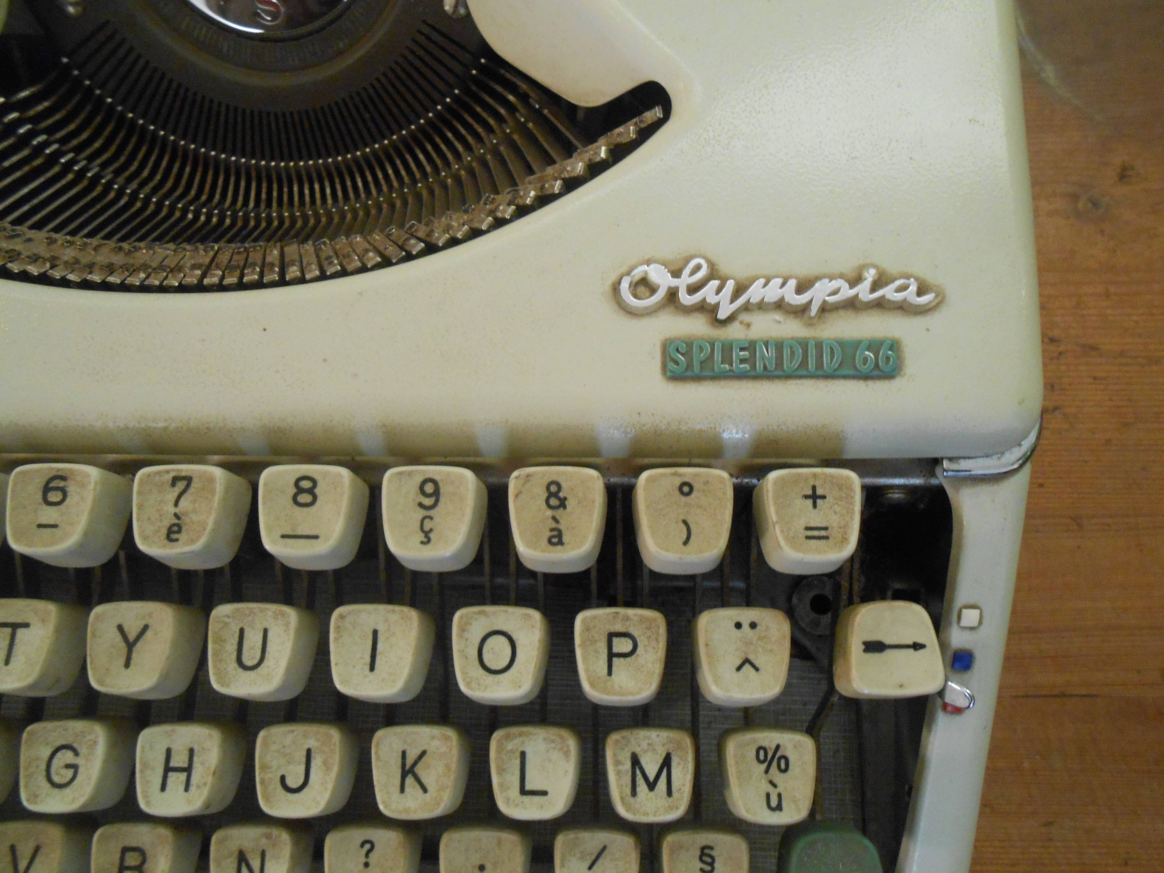 Typewriter Olympia 66, with cover