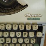 Typewriter Olympia 66, with cover