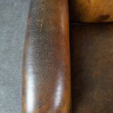 Patinated sheepskin armchair