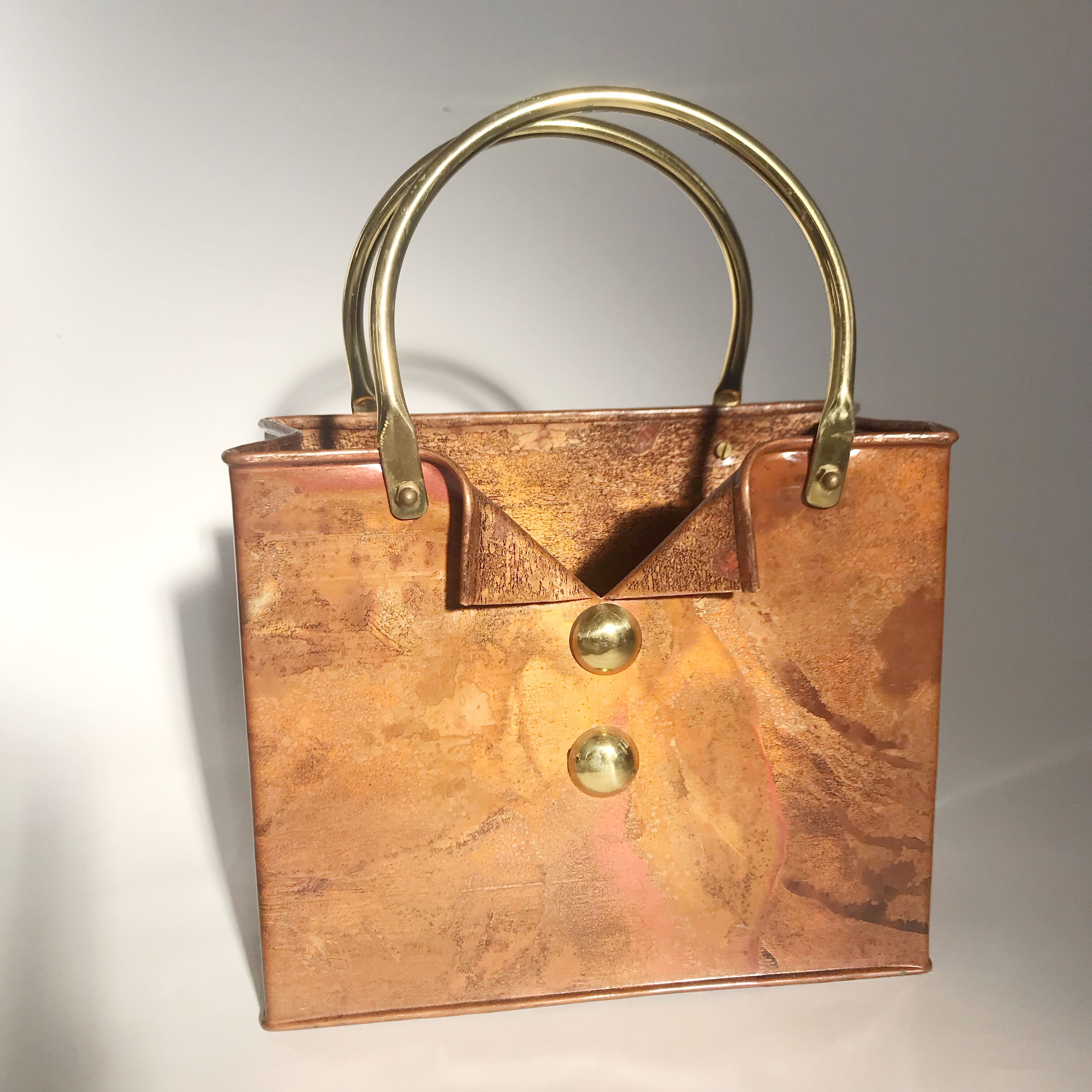 Copper and brass review holder