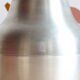 70s pear shaped ice bucket in brushed metal