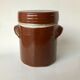 Small sandstone pot with lid