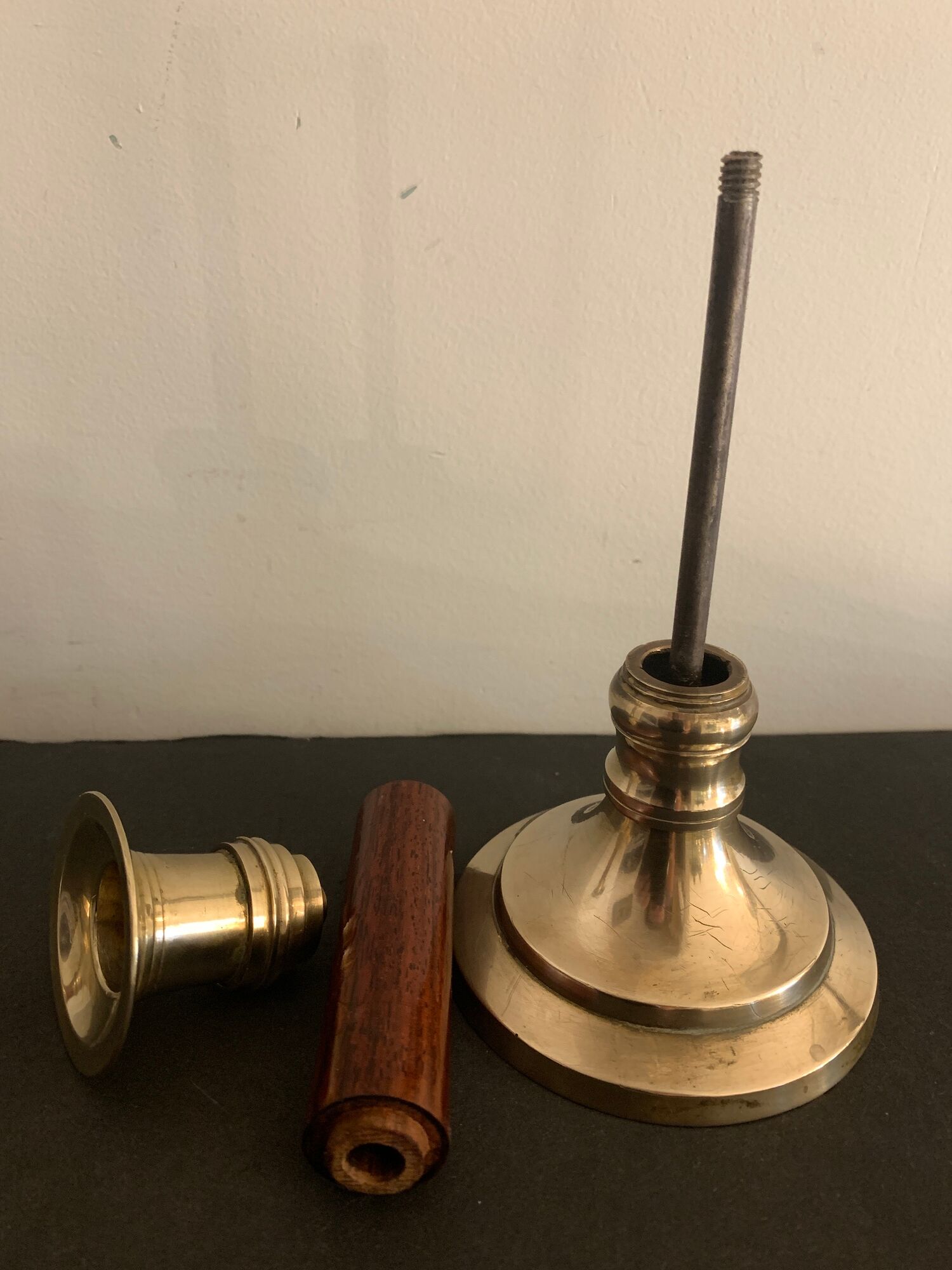 Pair of brass and mahogany wood candle holders