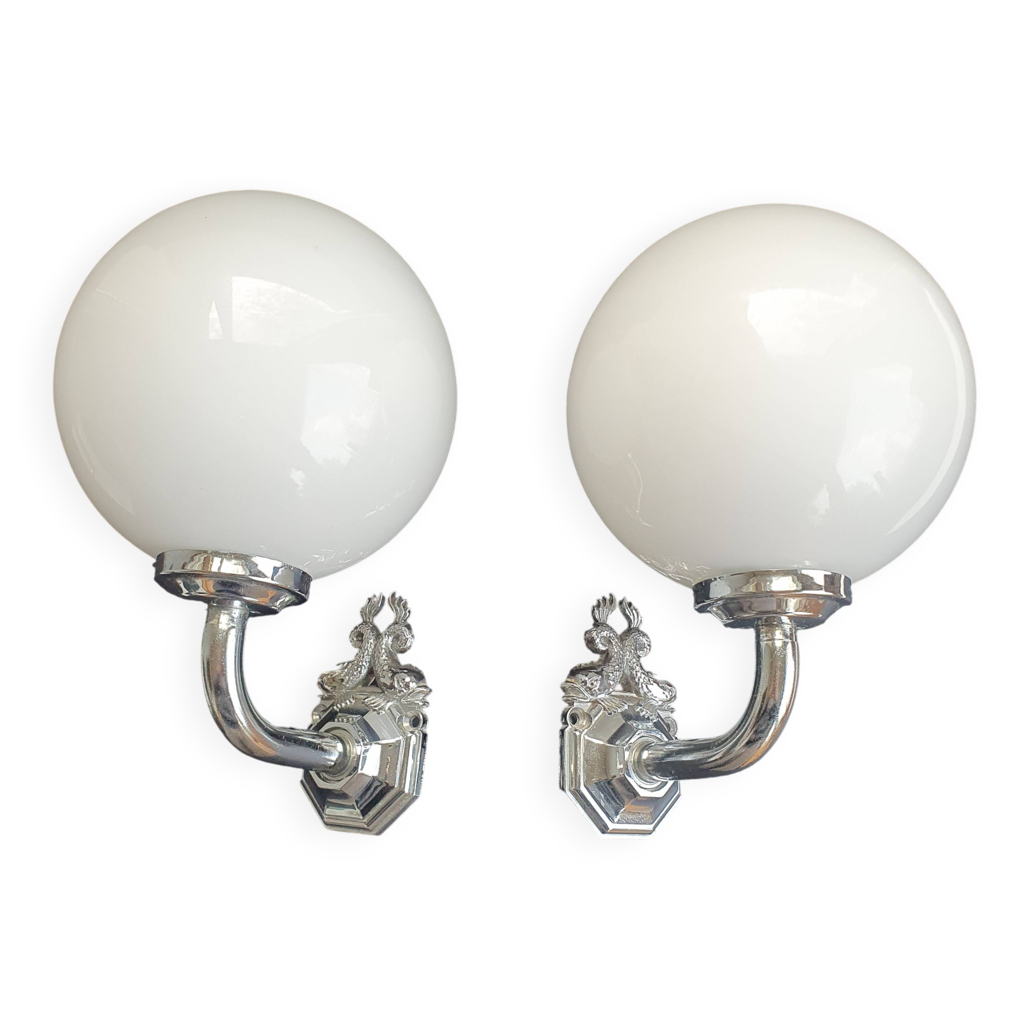 Pair of chrome wall sconces for bathroom with vintage fish pattern.