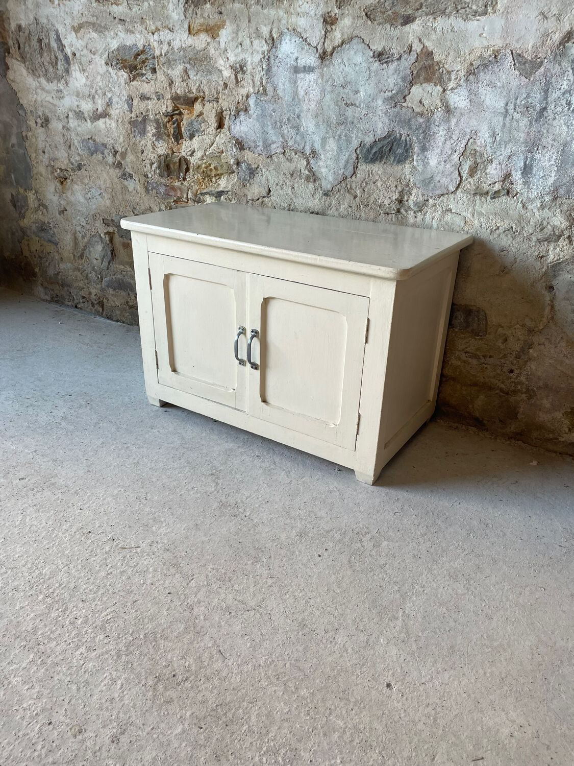 Antique white patinated low cabinet