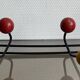 Iron wall coat rack and wooden hooks from the 60s