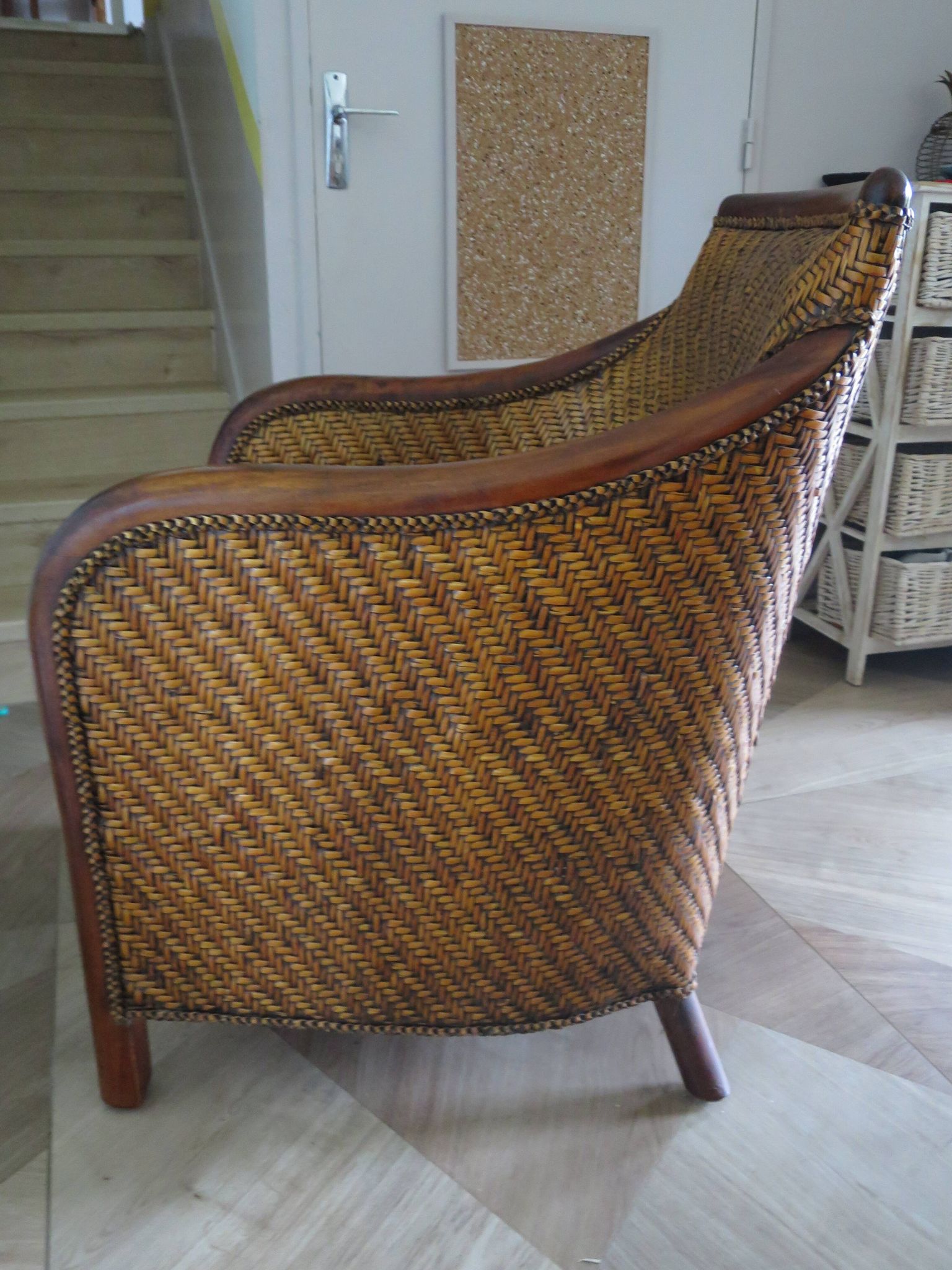 Woven rattan armchair and exotic wood in colonial style, 1980s.