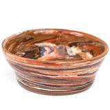 Terracotta cup in mixed earth