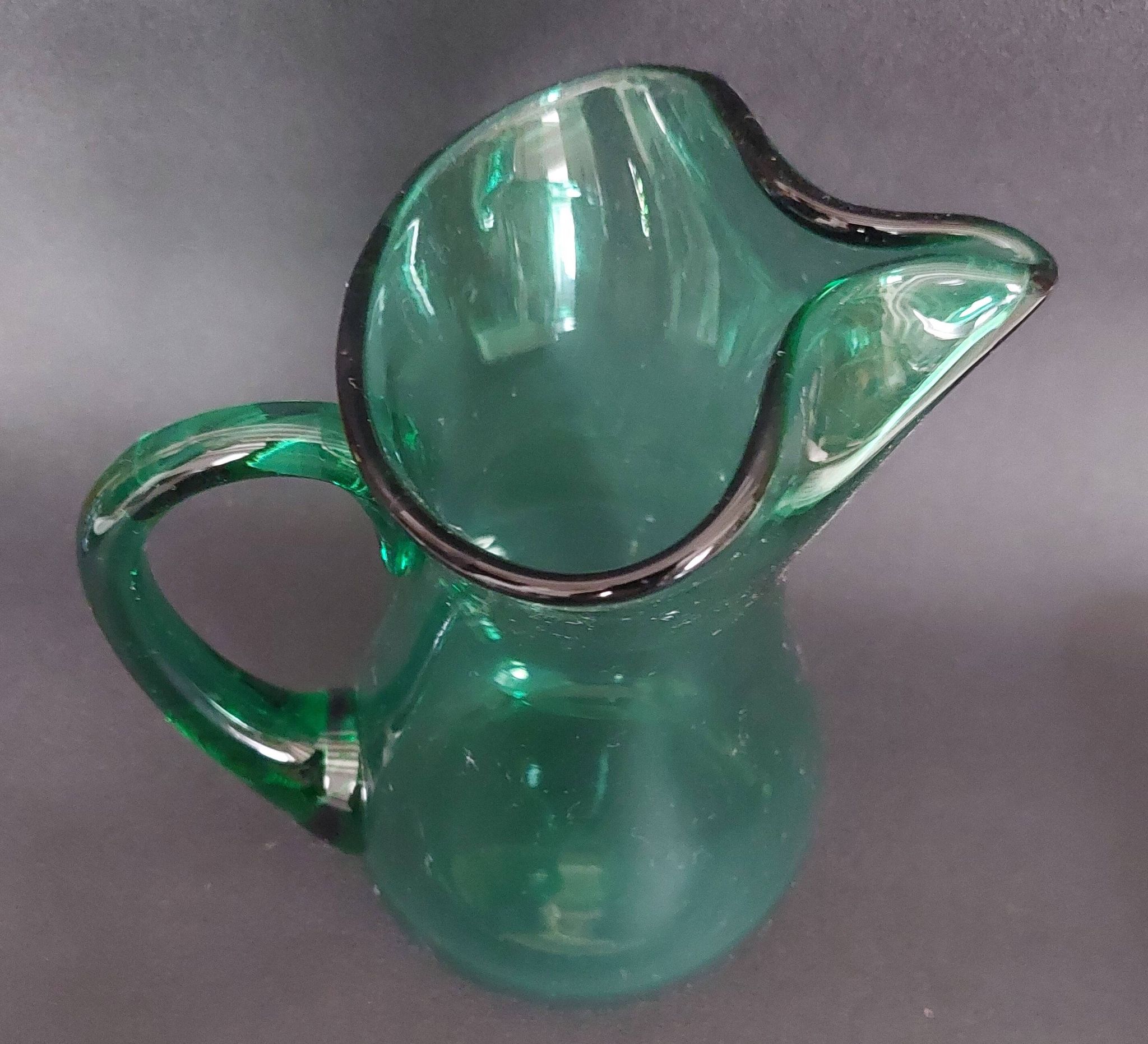 20th century green glass pitcher