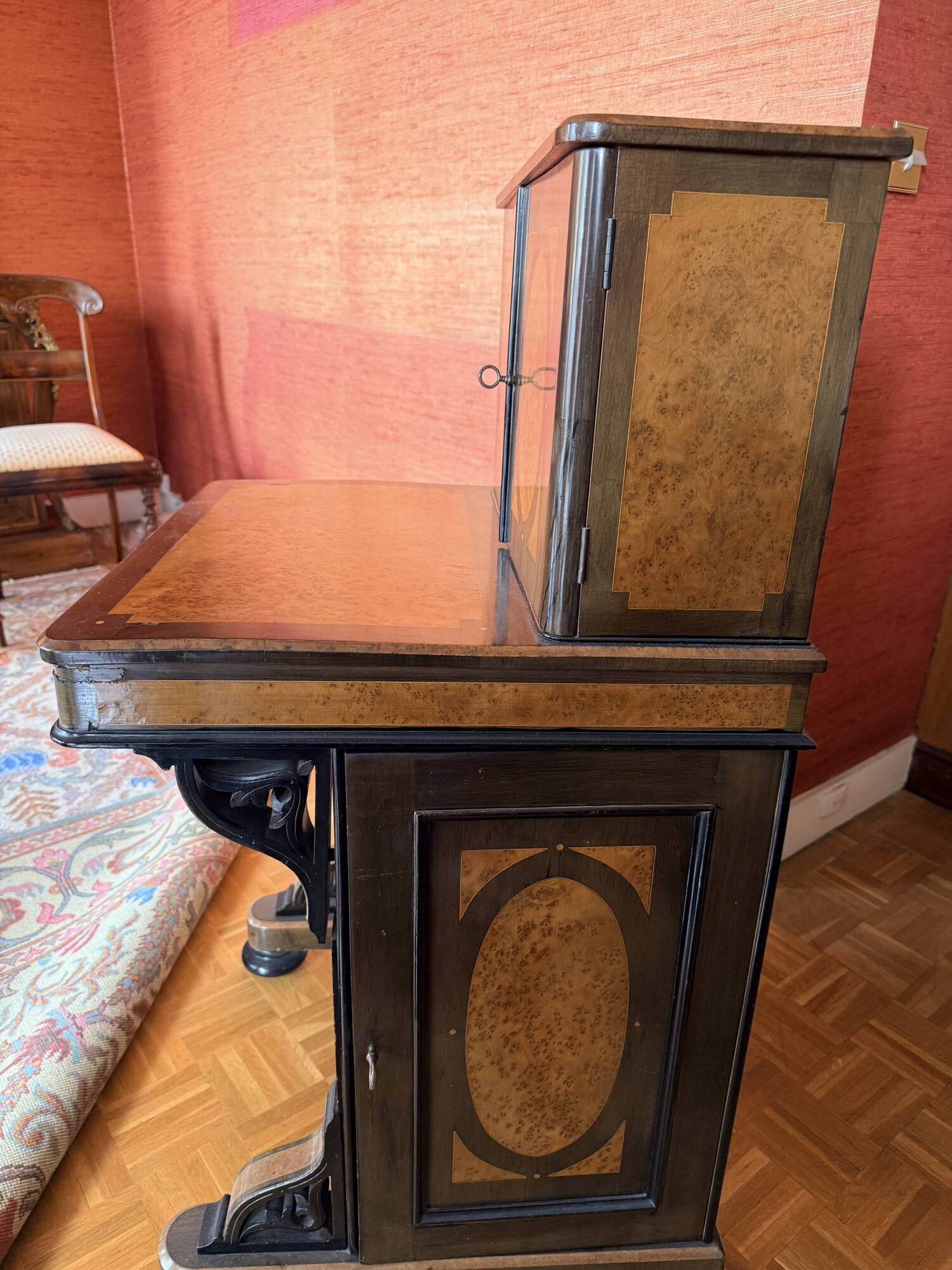 Victorian-era blackened wood and burr walnut Davenport.